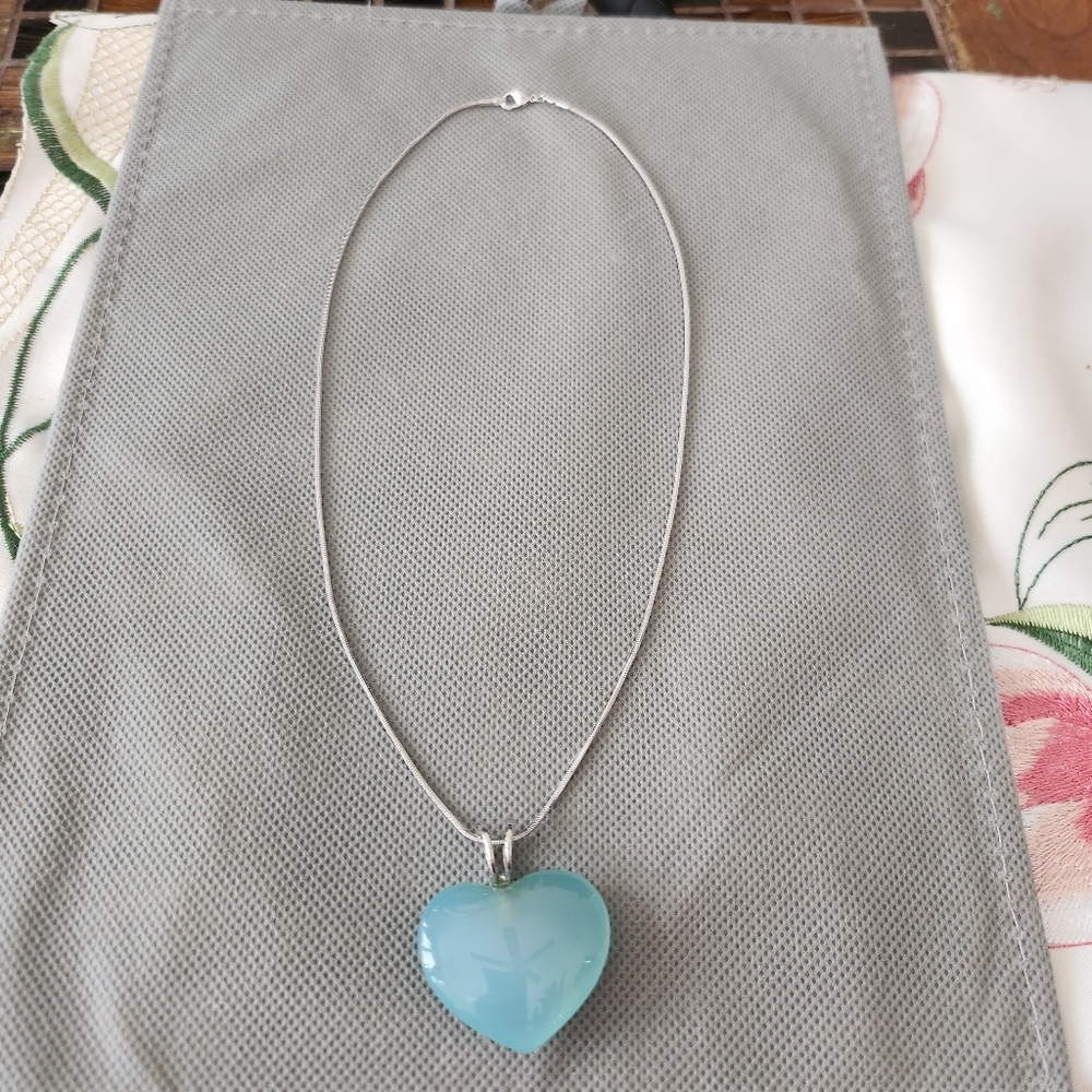 Silver necklace with blue heart pendant